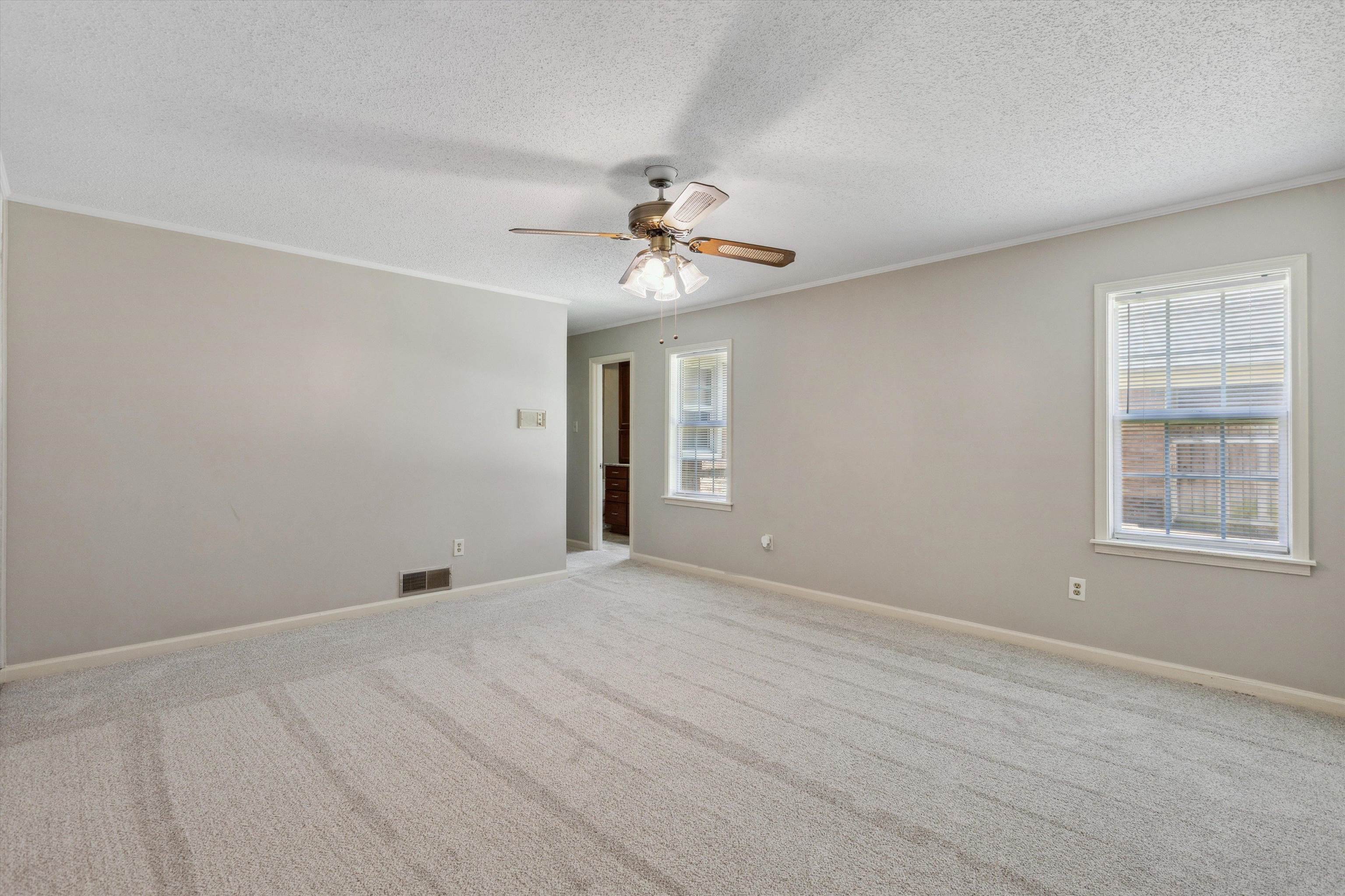 7617 Hollow Fork Road Germantown, TN 38138 - Photo 18 of 28 a view of an empty room with a window