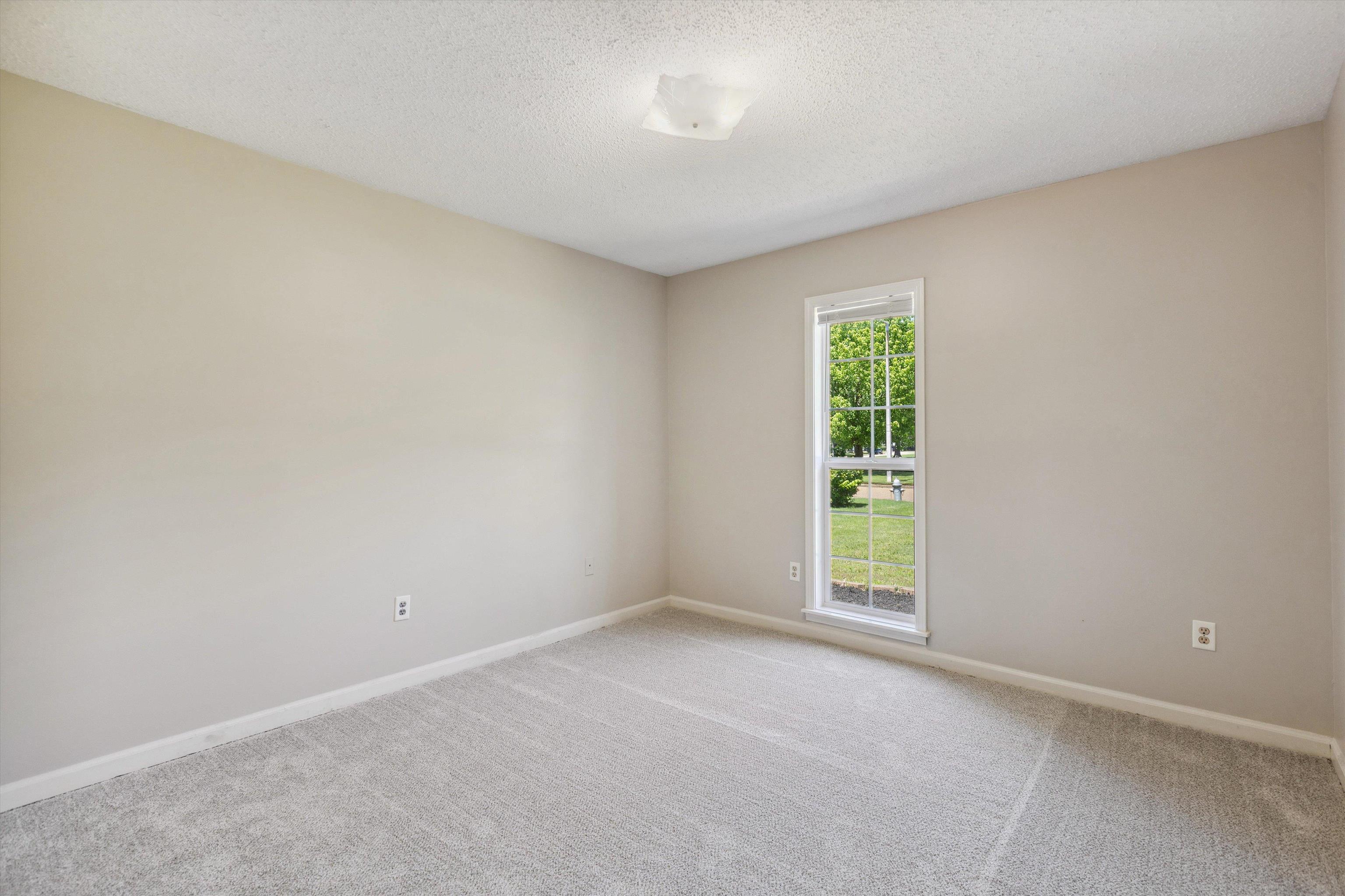 7617 Hollow Fork Road Germantown, TN 38138 - Photo 22 of 28 an empty room with windows