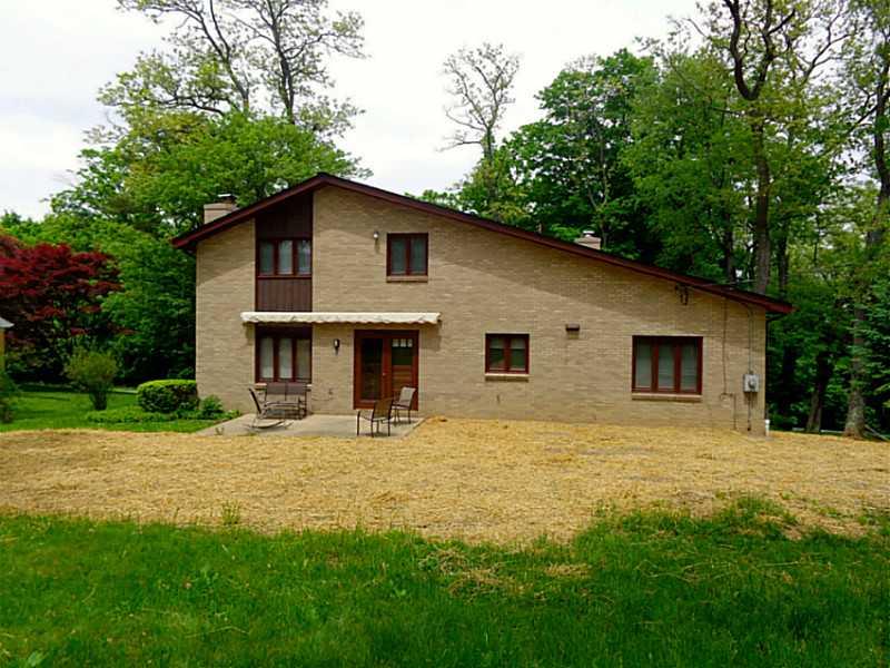 328 Johnston Road Upper St. Clair, PA 15241 - Photo 24 of 25 Exterior Back. Backyard with automatic awning