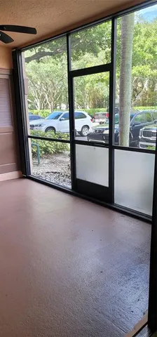 a view of a room with a large window