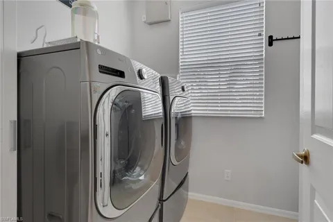 a utility room with a washer and dryer