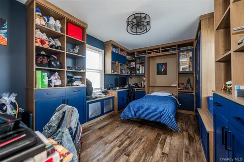 a view of a workspace with furniture and toys