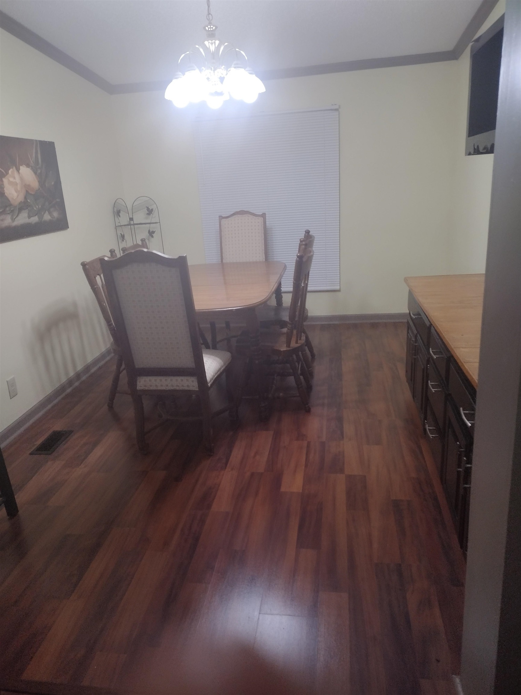 348 Sanford Road Covington, TN 38019 - Photo 19 of 23 a view of a dining room with furniture and wooden floor