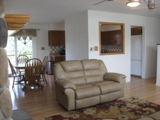 1029 South Cooper Road New Lenox, IL 60451 - Photo 9 of 11 a living room with furniture and a flat screen tv