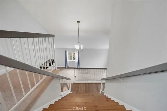 a view of entryway and kitchen