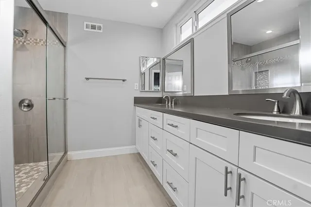 a bathroom with a shower and a toilet