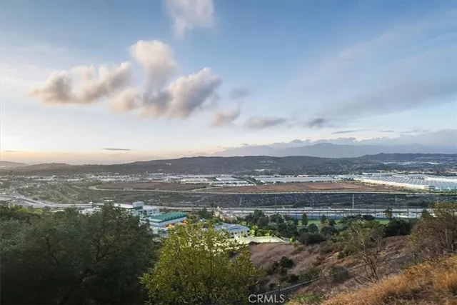 an aerial view of residential houses and outdoor space
