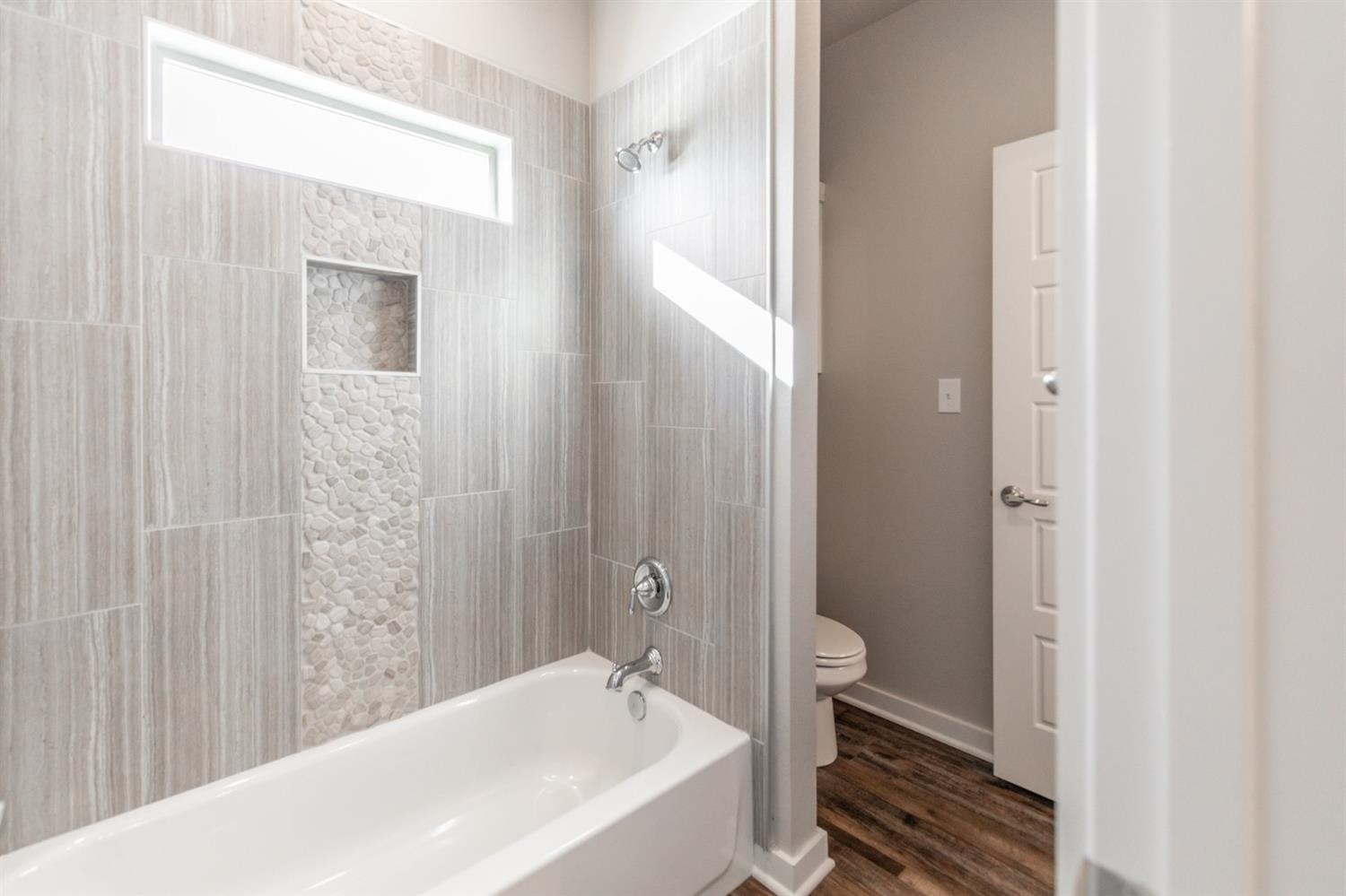 13311 Gardner Lubbock, TX 79424 - Photo 23 of 32 a bathroom with a bathtub and shower