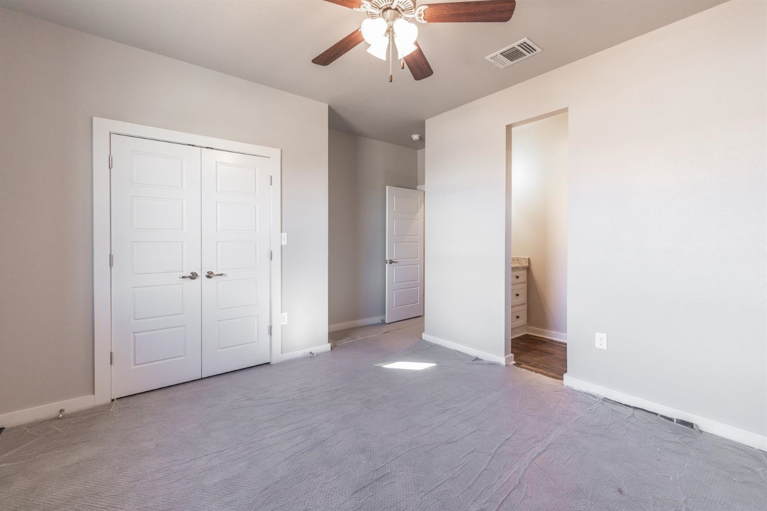 13311 Gardner Lubbock, TX 79424 - Photo 26 of 32 an empty room with fan and entrance