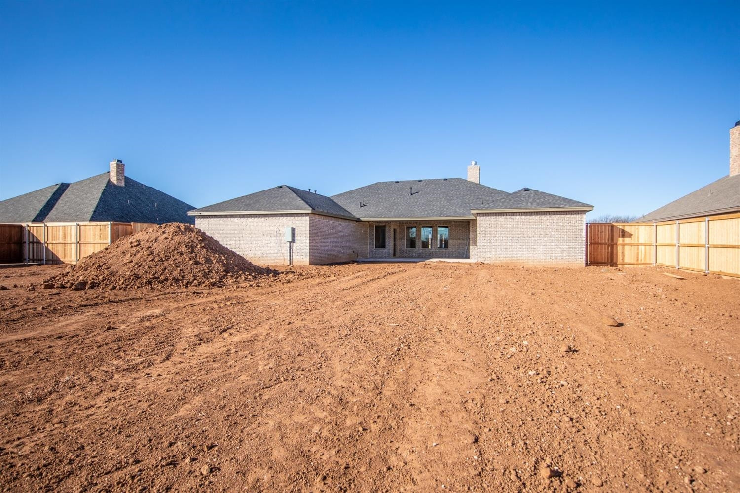 13311 Gardner Lubbock, TX 79424 - Photo 31 of 32 a front view of a house with a yard and garage