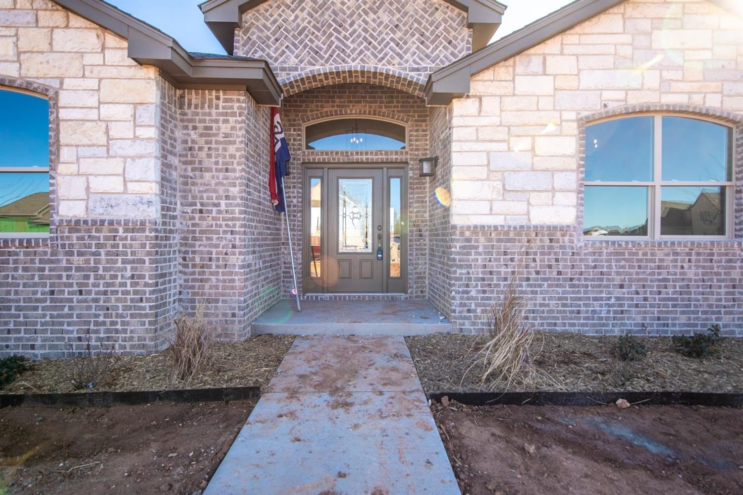 13311 Gardner Lubbock, TX 79424 - Photo 32 of 32 a view of a brick house with a street