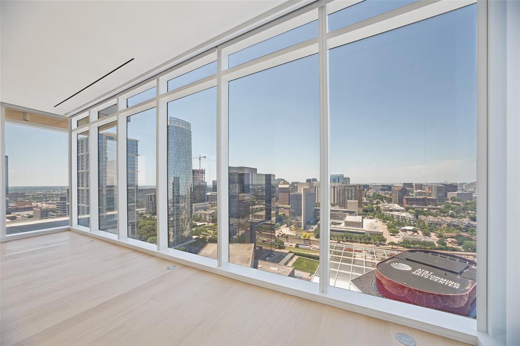 1747 Leonard Street, Unit 2002 Dallas, TX 75201 - Photo 8 of 33 a view of a city from a living room