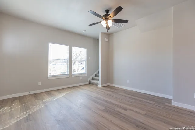 a kitchen with stainless steel appliances a refrigerator sink and microwave