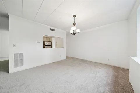 en empty room with windows