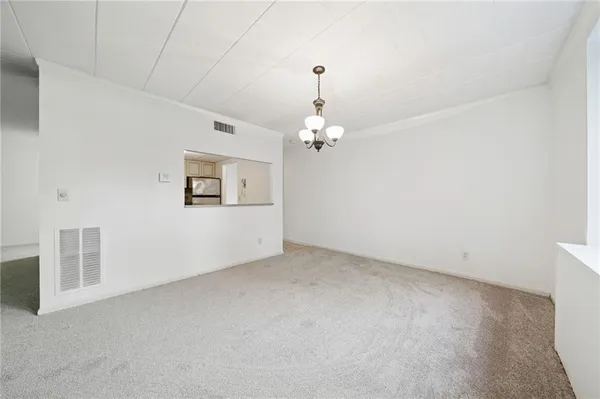 en empty room with windows