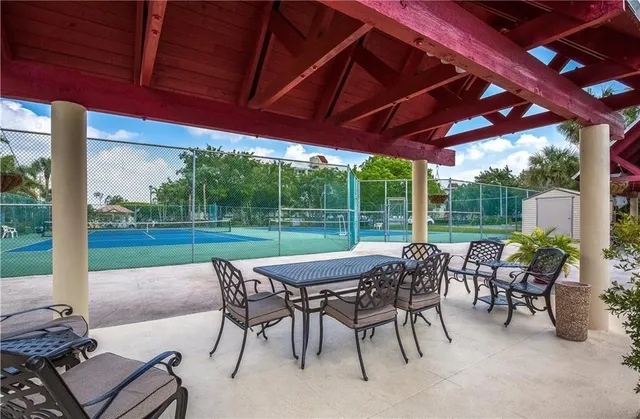 a view of a dining room with furniture