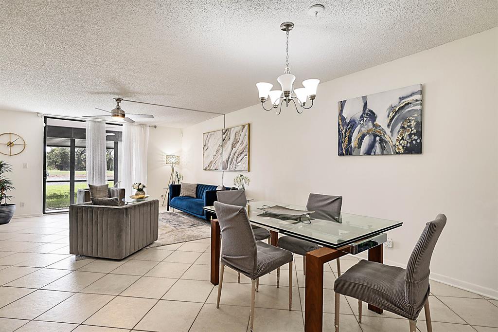 3485 Environ Boulevard, Unit C106 Lauderhill, FL 33319 - Photo 15 of 33 a view of a livingroom with furniture and window