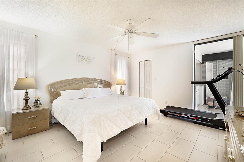 3485 Environ Boulevard, Unit C106 Lauderhill, FL 33319 - Photo 20 of 33 a bedroom with a bed and a window