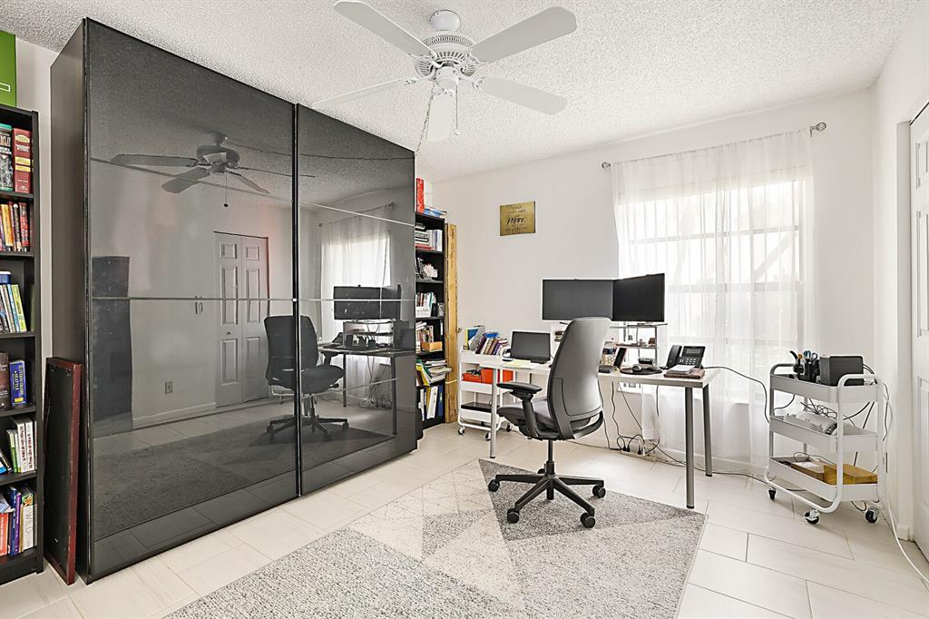3485 Environ Boulevard, Unit C106 Lauderhill, FL 33319 - Photo 23 of 33 a view of a livingroom with workspace and a window