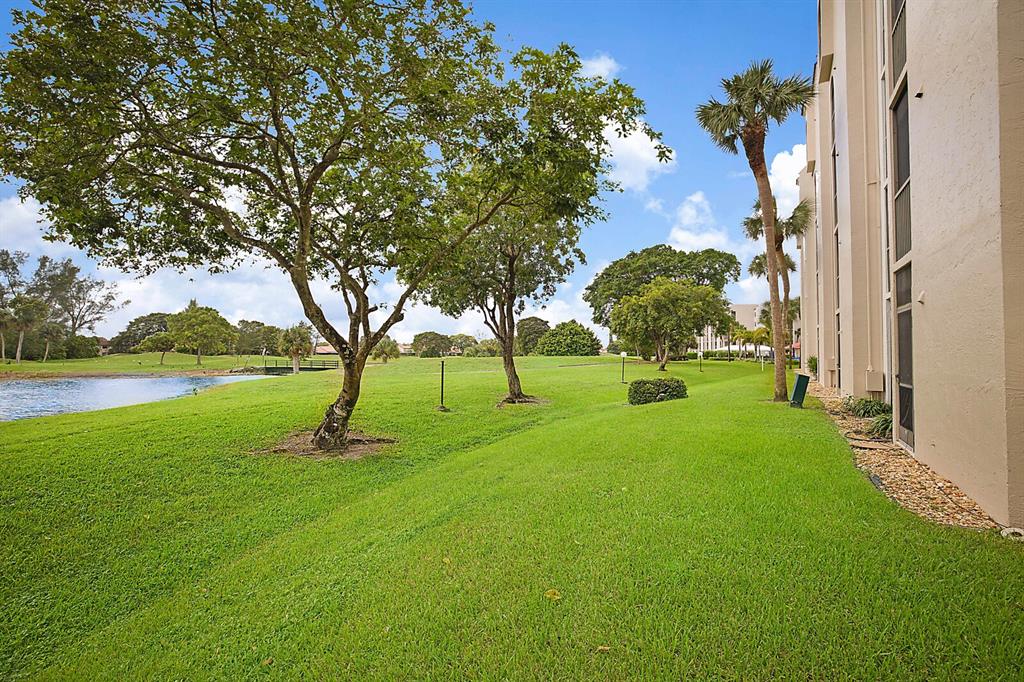 3485 Environ Boulevard, Unit C106 Lauderhill, FL 33319 - Photo 26 of 33 a view of a park with large trees