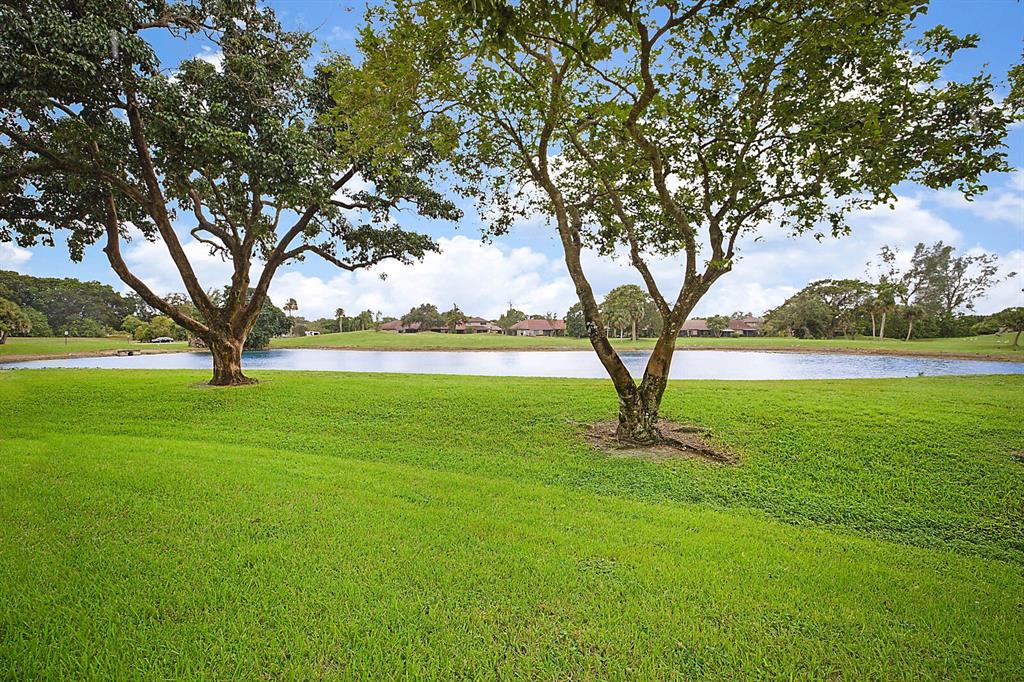 3485 Environ Boulevard, Unit C106 Lauderhill, FL 33319 - Photo 27 of 33 a park with trees in the background