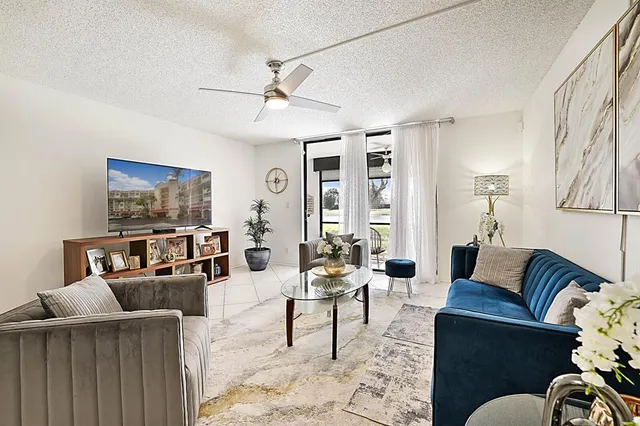 a living room with furniture and a couch