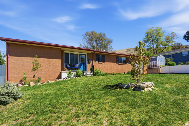 935 900 North Bountiful, UT 84010 - Photo 2 of 46 Back of house featuring brick siding