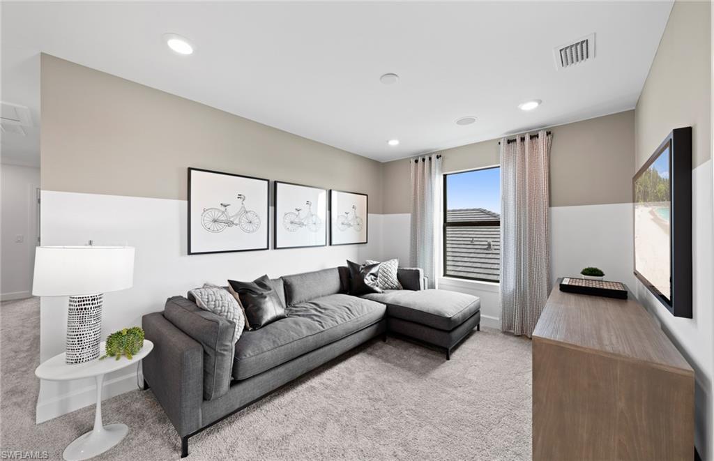 1879 Mesa Lane Naples, FL 34120 - Photo 13 of 24 a living room with furniture and a wooden floor