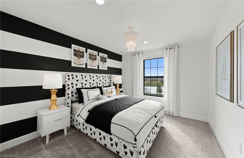 1879 Mesa Lane Naples, FL 34120 - Photo 19 of 24 a bedroom with a large bed and a window