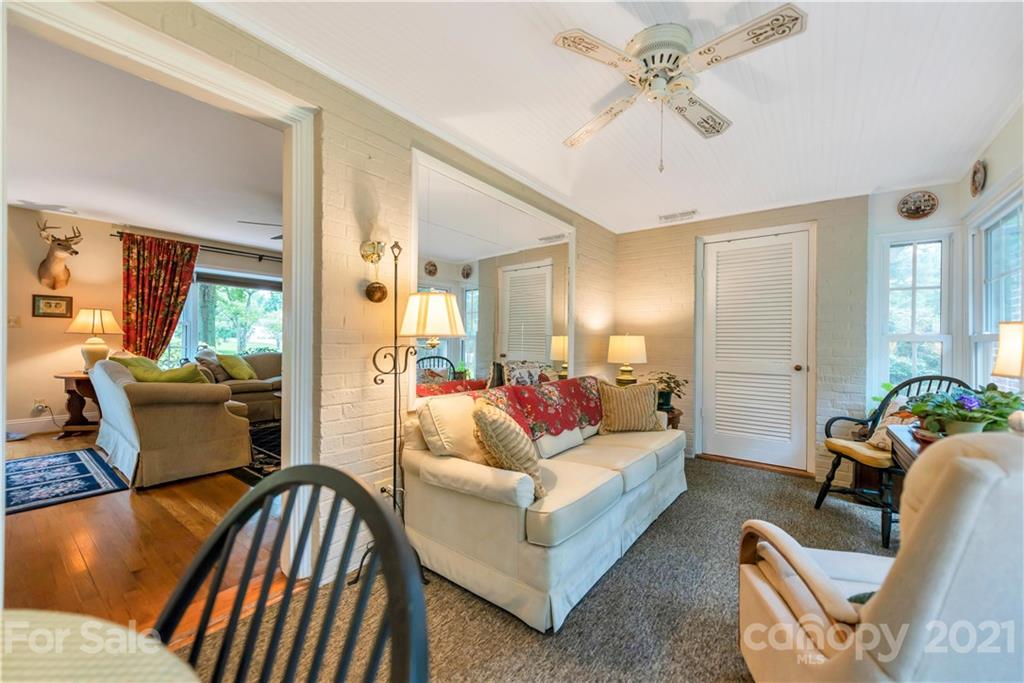 404 Dameron Road Bessemer City, NC 28016 - Photo 14 of 47 a living room with furniture or couch and a chandelier
