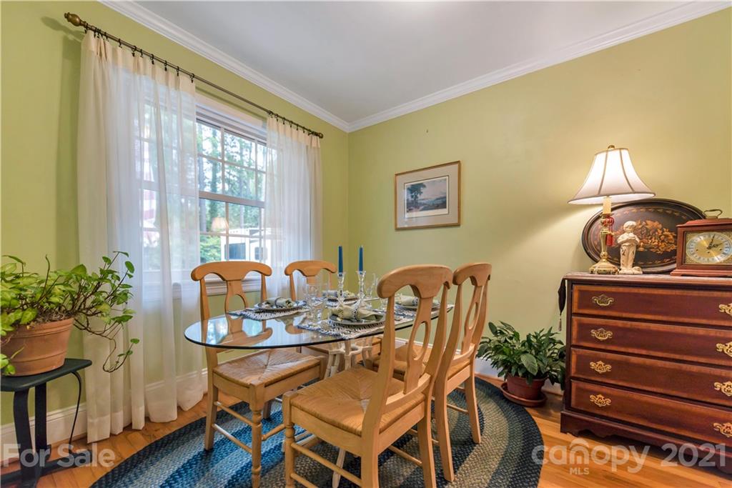 404 Dameron Road Bessemer City, NC 28016 - Photo 17 of 47 a dining room with furniture and wooden floor