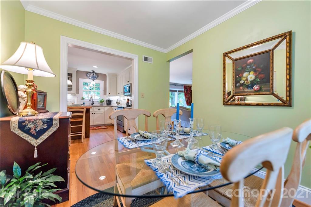 404 Dameron Road Bessemer City, NC 28016 - Photo 19 of 47 a dining room with furniture and wooden floor