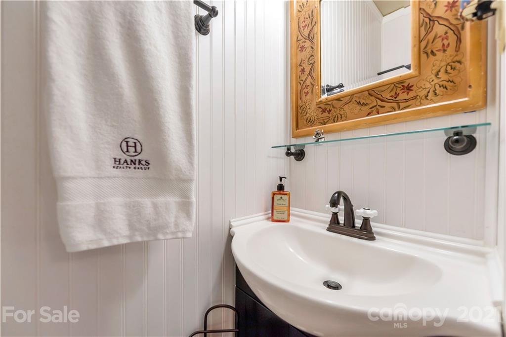 404 Dameron Road Bessemer City, NC 28016 - Photo 36 of 47 a bathroom with a sink and a mirror