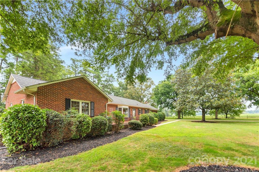404 Dameron Road Bessemer City, NC 28016 - Photo 5 of 47 a front view of house with yard and trees