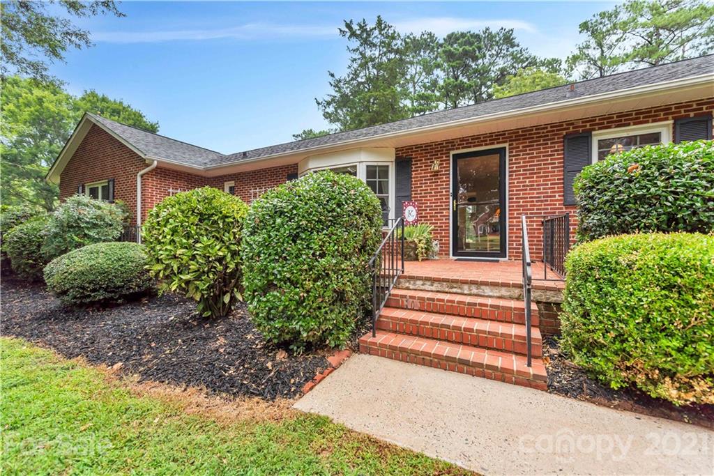 404 Dameron Road Bessemer City, NC 28016 - Photo 6 of 47 a view of a house with backyard and plants