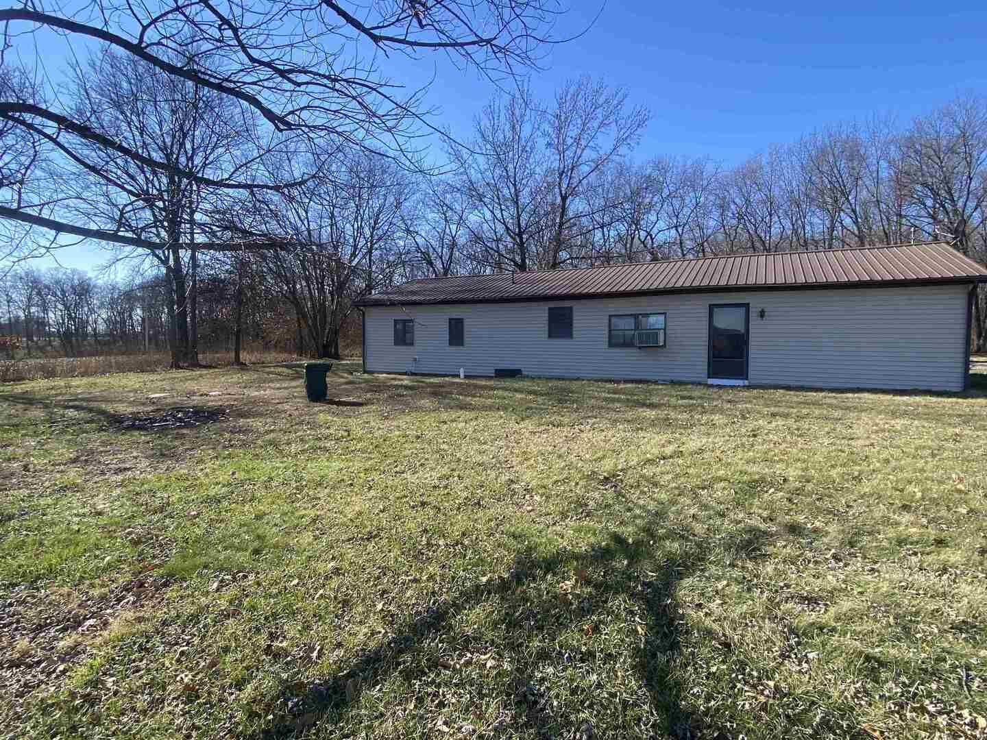7038 Robin Road Du Bois, IL 62831 - Photo 24 of 29 a view of a backyard with large trees