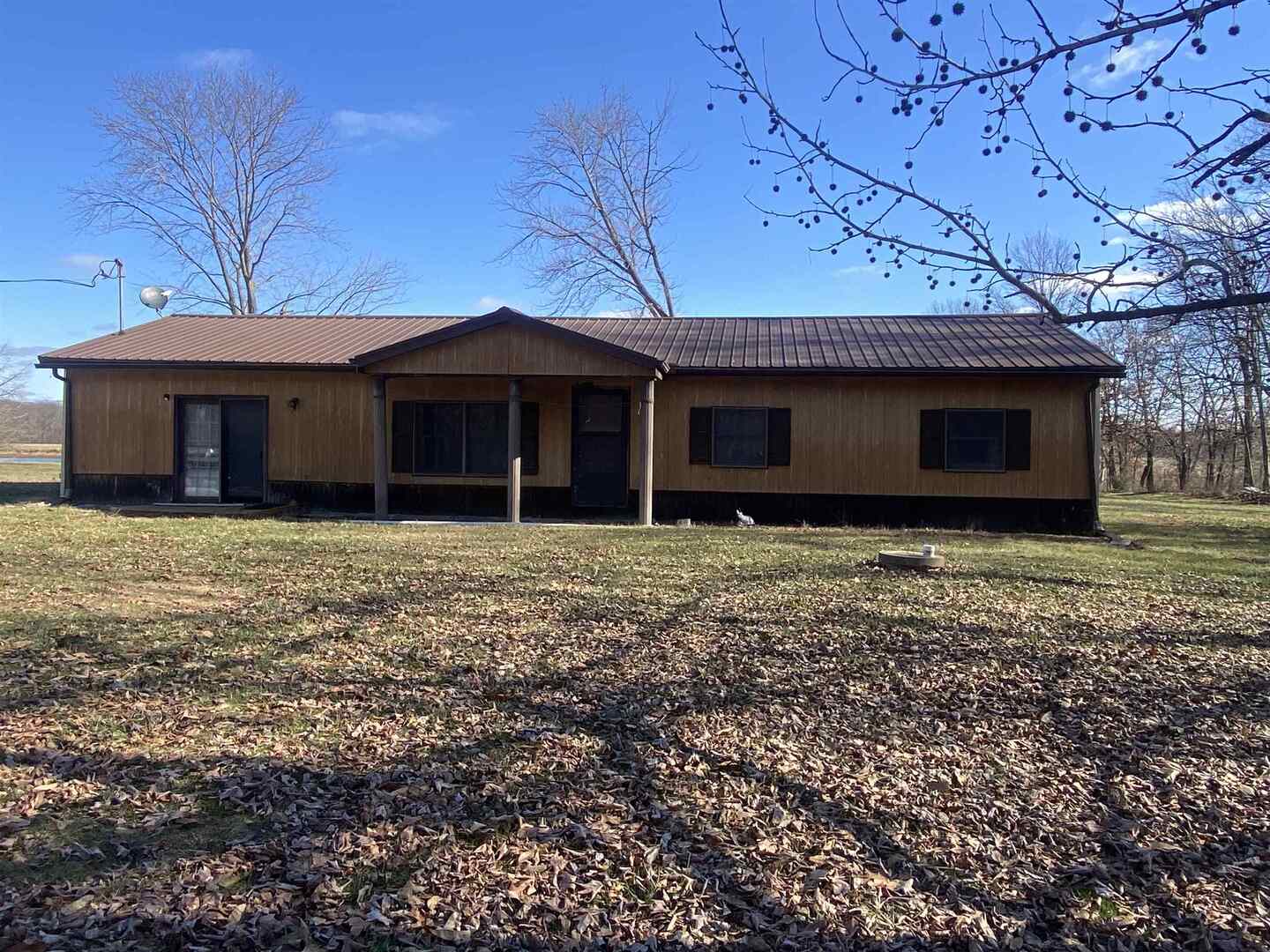 7038 Robin Road Du Bois, IL 62831 - Photo 3 of 29 a view of a house with a garden