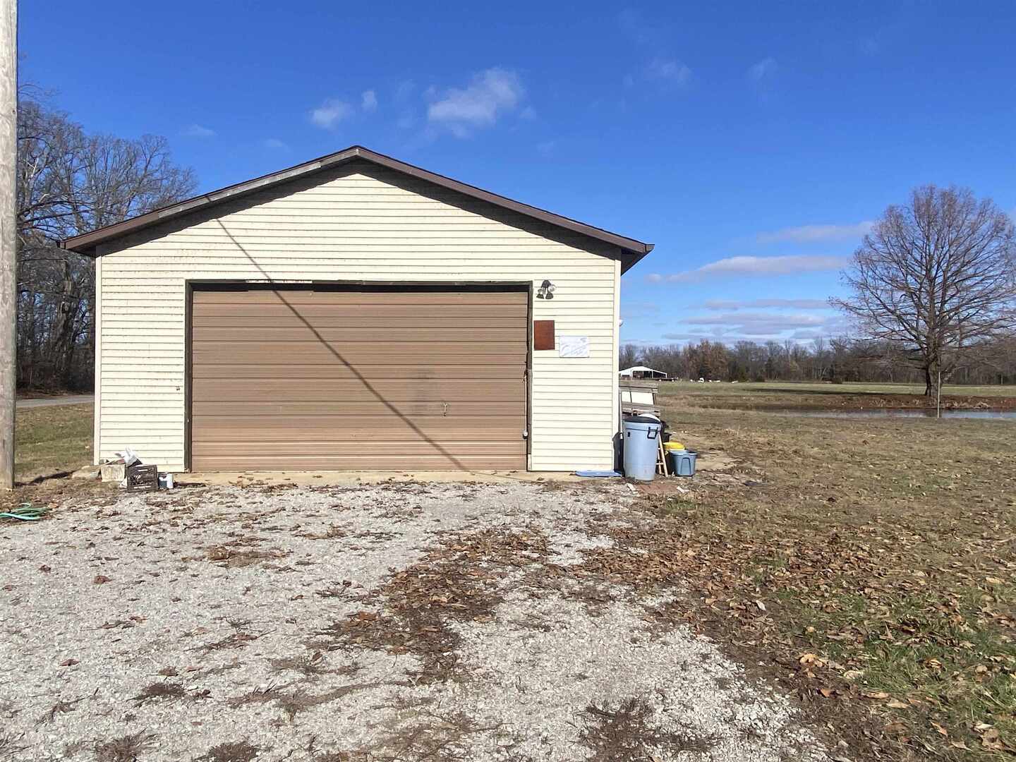 7038 Robin Road Du Bois, IL 62831 - Photo 4 of 29 a front view of a house with a yard