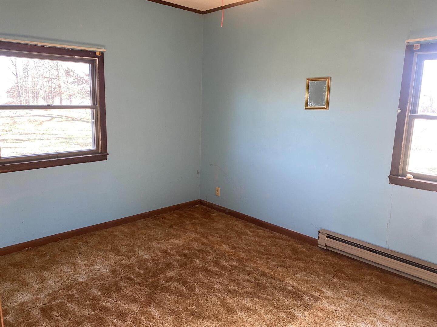 7038 Robin Road Du Bois, IL 62831 - Photo 5 of 29 an empty room with a window