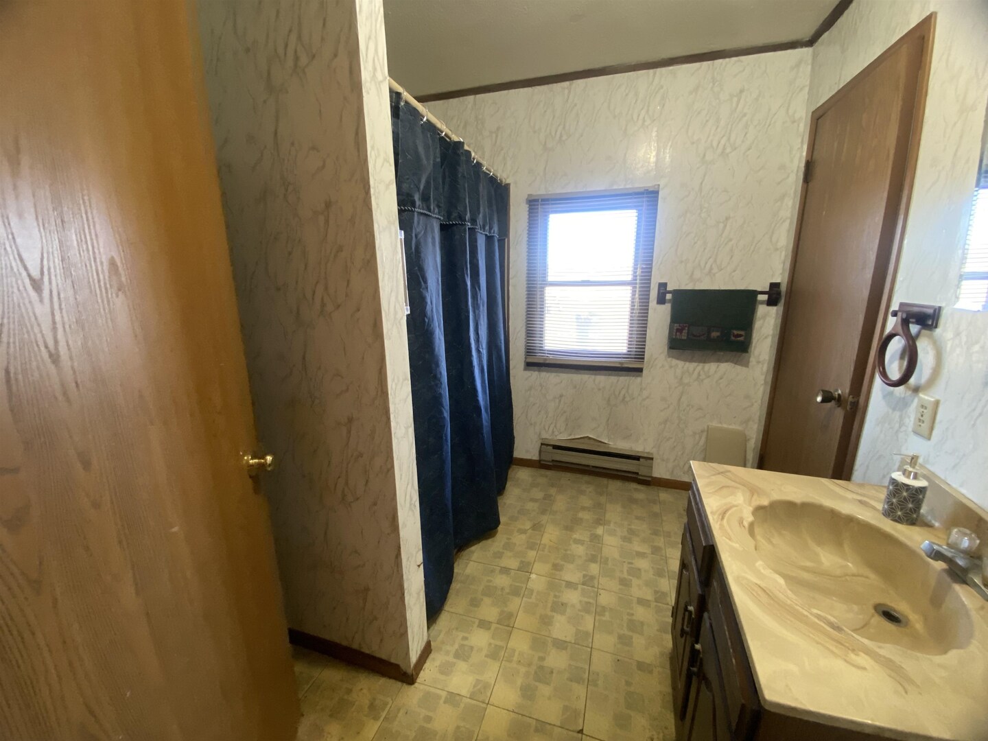7038 Robin Road Du Bois, IL 62831 - Photo 9 of 29 a bathroom with a sink and a mirror