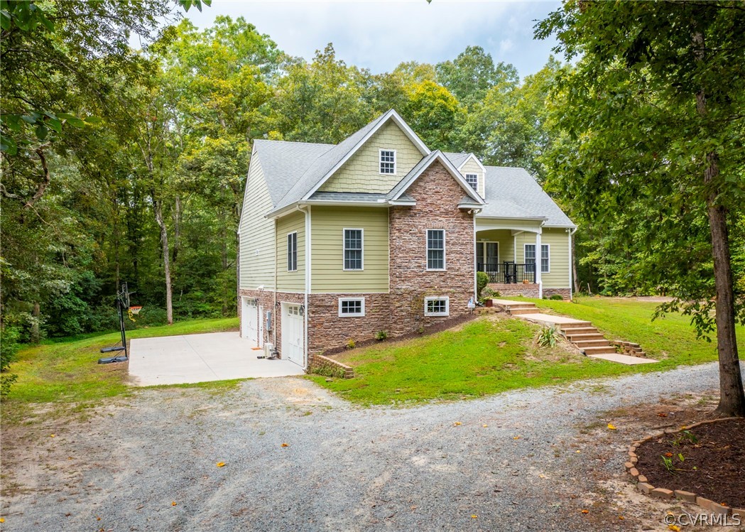529 Brandywine Road Manquin, VA 23106 - Photo 1 of 50 a view of a house with a yard and tree s