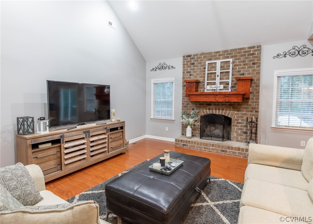 529 Brandywine Road Manquin, VA 23106 - Photo 11 of 50 a living room with furniture and a fireplace