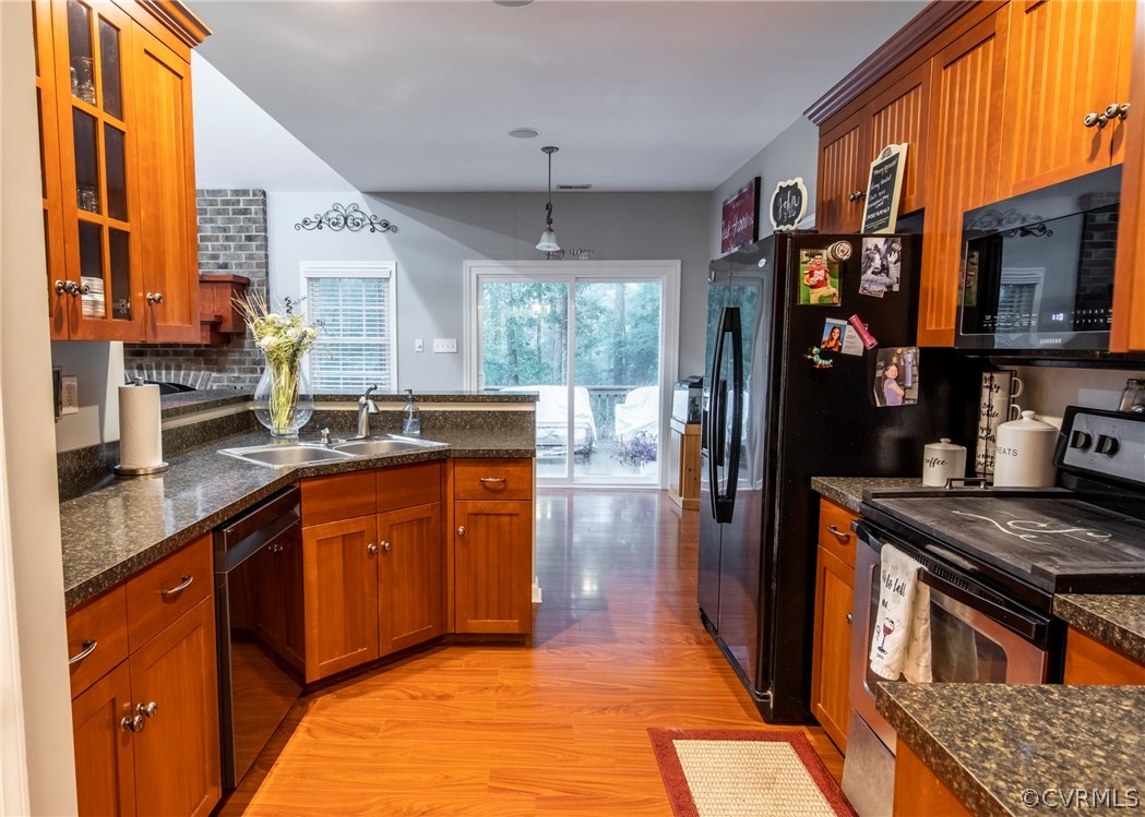529 Brandywine Road Manquin, VA 23106 - Photo 18 of 50 a kitchen with stainless steel appliances granite countertop a sink stove and refrigerator