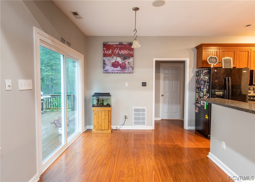 529 Brandywine Road Manquin, VA 23106 - Photo 19 of 50 a view of a room with wooden floor and a window