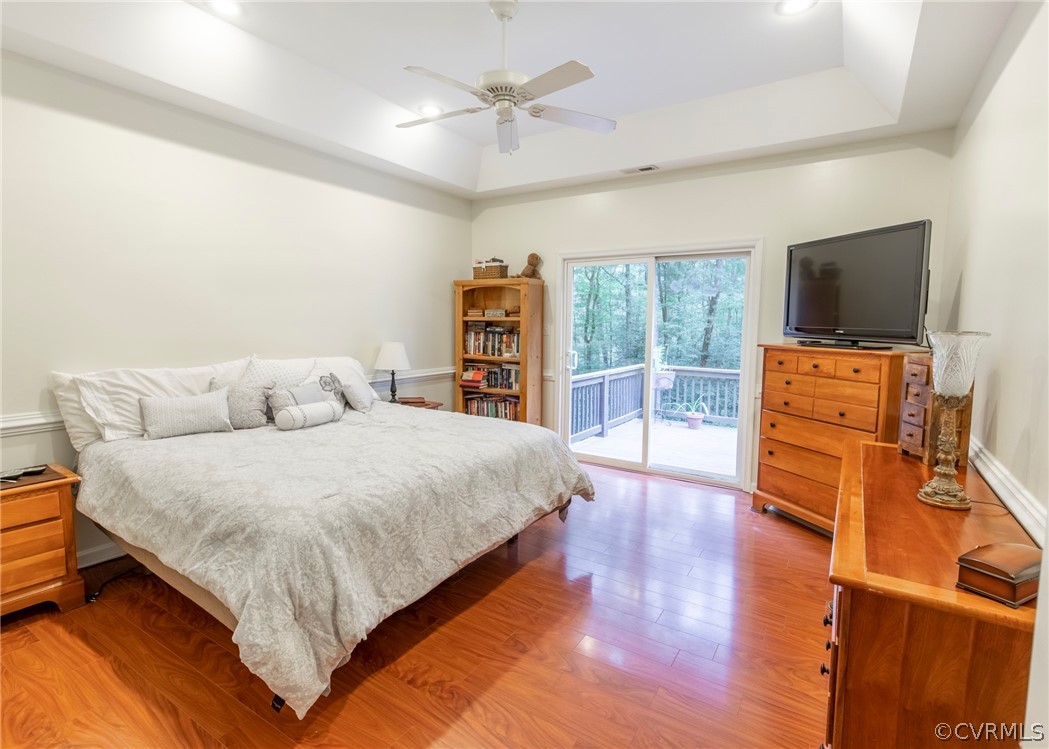 529 Brandywine Road Manquin, VA 23106 - Photo 29 of 50 a bedroom with a bed and a flat screen tv