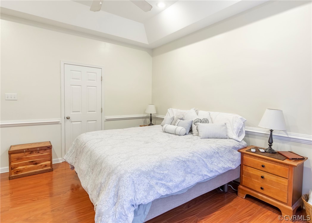 529 Brandywine Road Manquin, VA 23106 - Photo 31 of 50 a bedroom with a bed and a lamp on the dresser