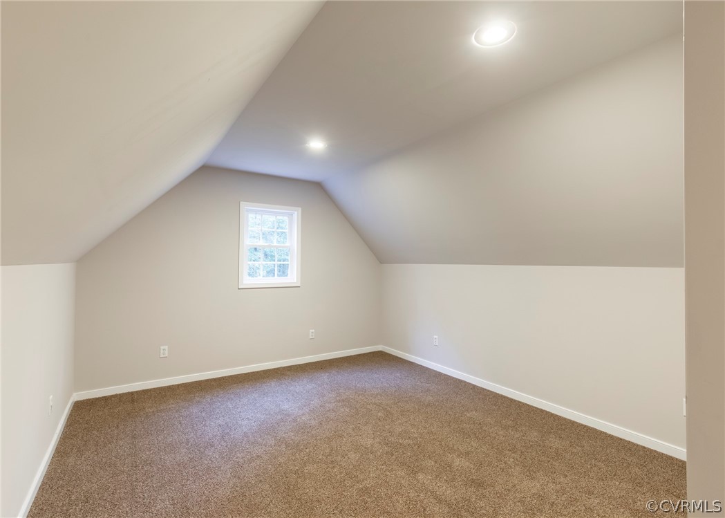 529 Brandywine Road Manquin, VA 23106 - Photo 38 of 50 an empty room with a empty space and windows