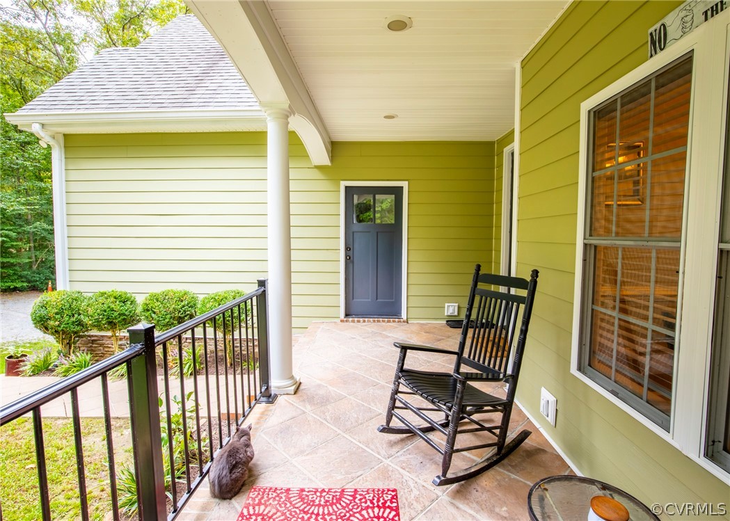 529 Brandywine Road Manquin, VA 23106 - Photo 5 of 50 a view of a chair and tables in the balcony
