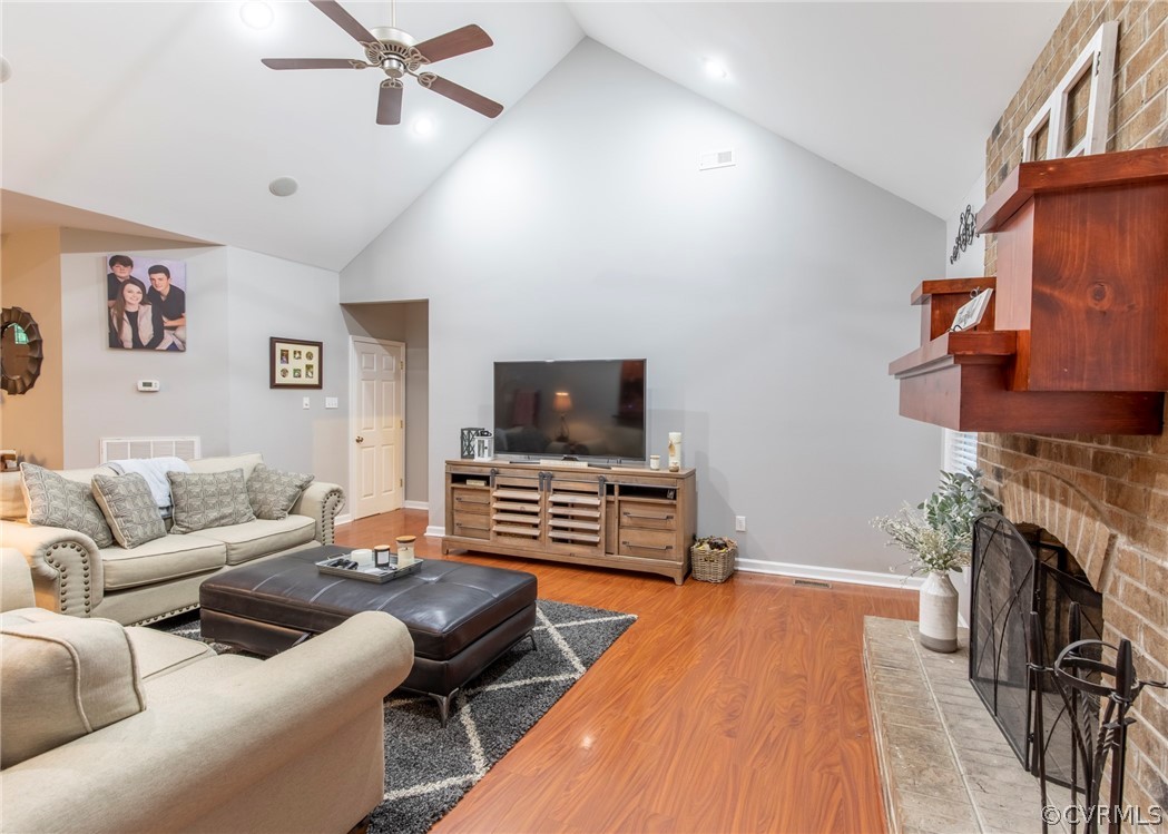 529 Brandywine Road Manquin, VA 23106 - Photo 7 of 50 a living room with furniture and a fireplace