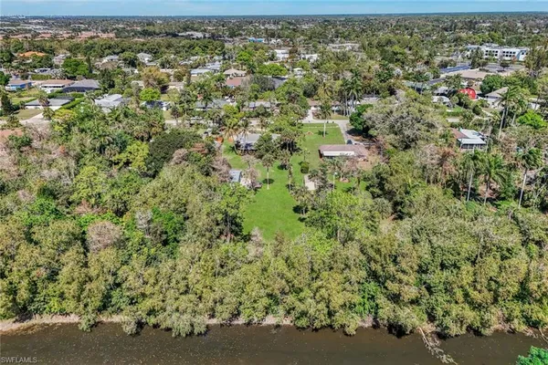 an aerial view of residential house with parking space